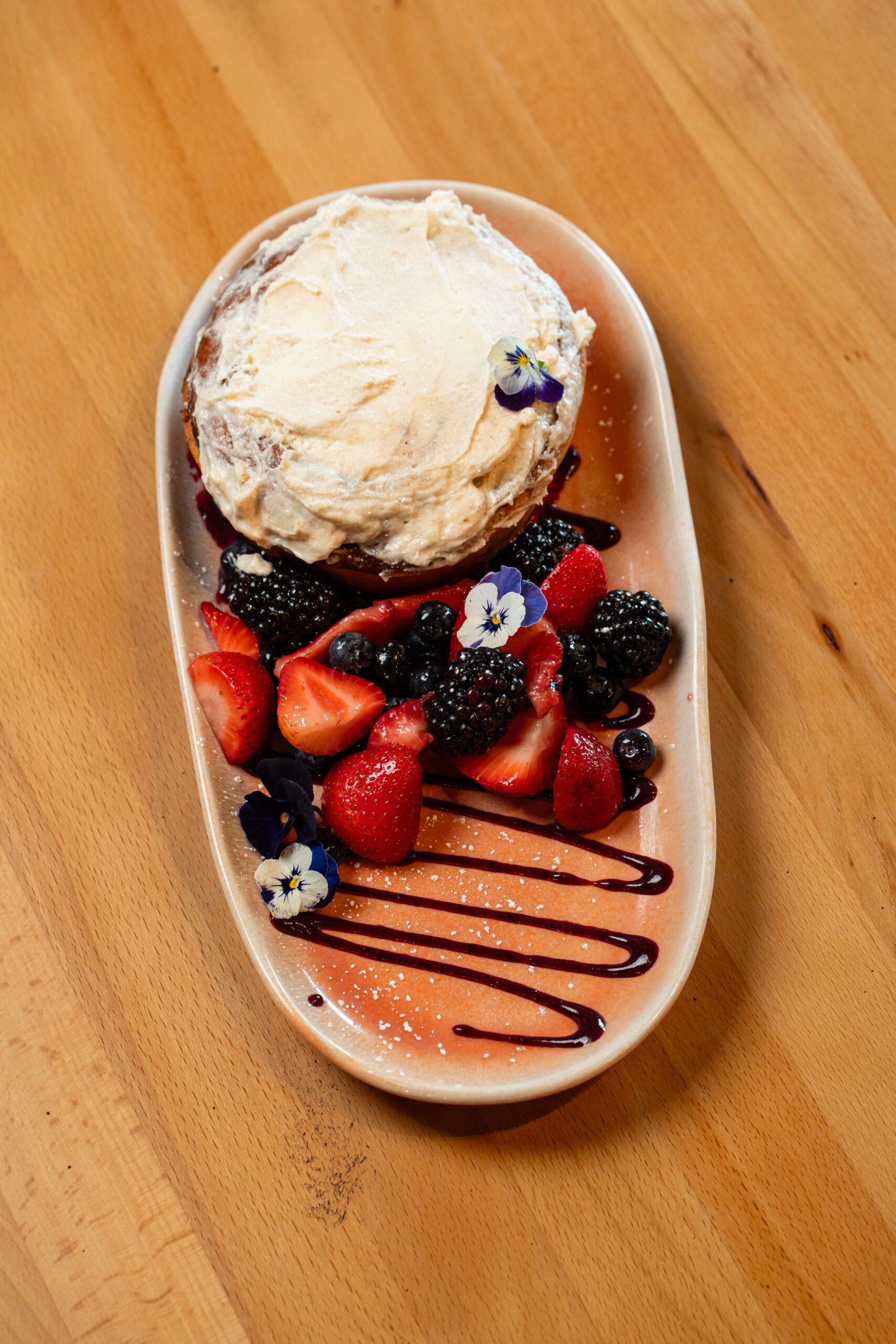 CINNAMON ROLL AND BERRIES